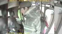 CCTV captures a thug punching a bus driver in the face